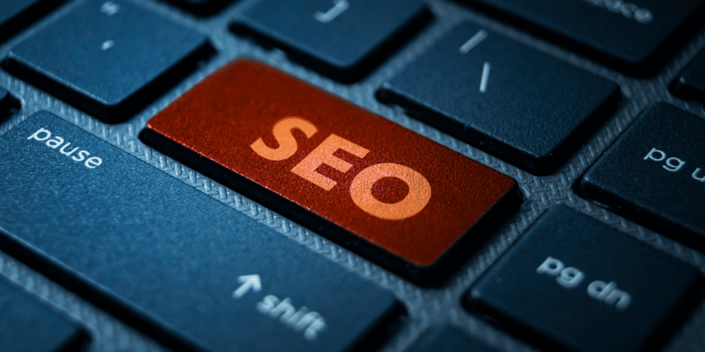 Close-up of a keyboard with a red SEO key symbolizing search engine optimization strategy