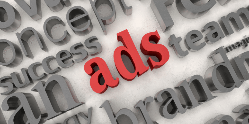 google-facebook-ads-digital-marketing-strategy 3D typography with the word ads highlighted in red, surrounded by marketing and advertising related words on a white background